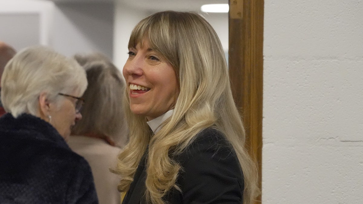 Sarah Trone Garriott smiles at Iowans.