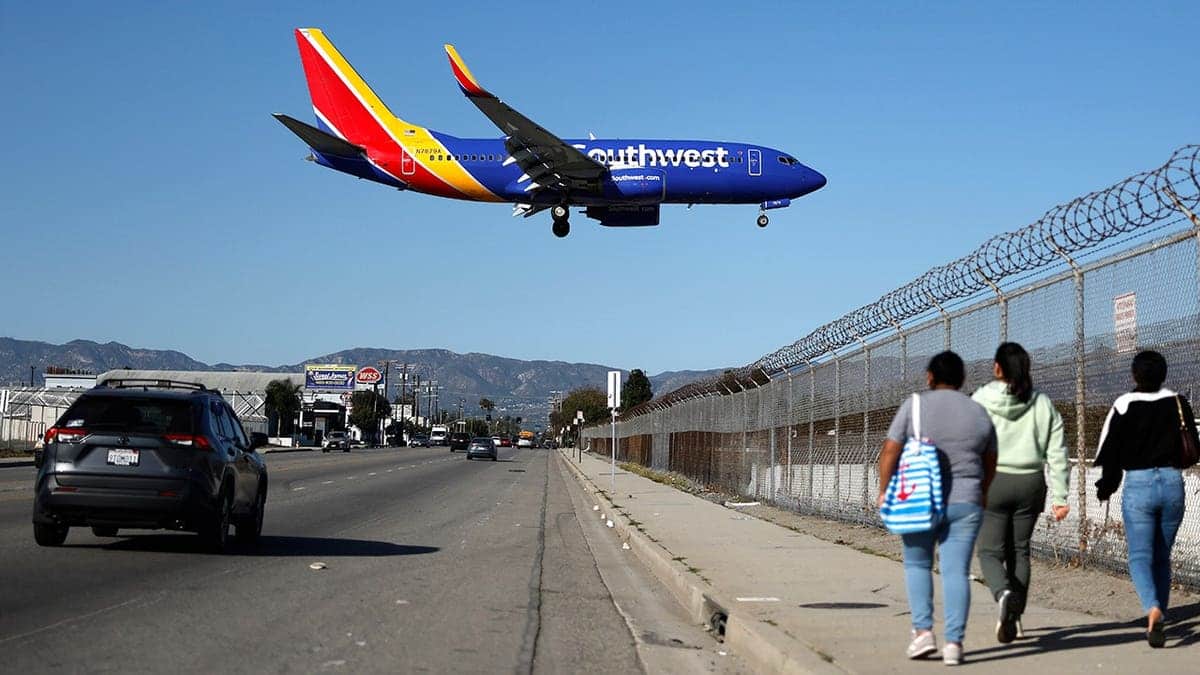 A Southwest Airlines plane descending to land at Hollywood Burbank Airport.