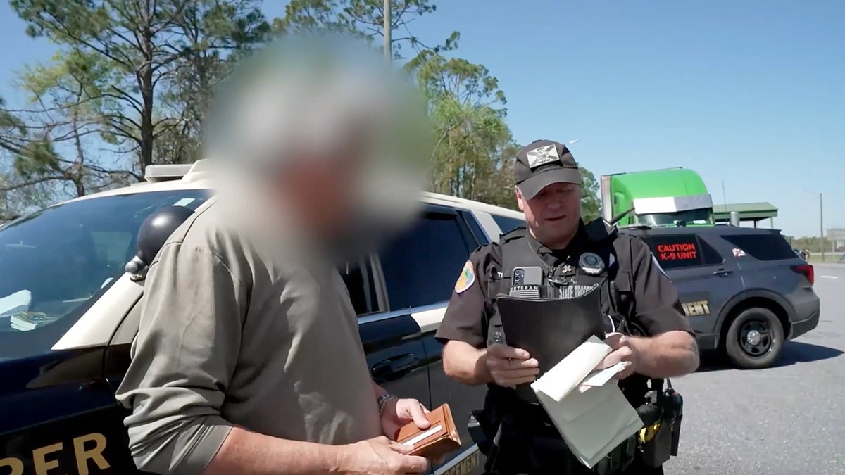 EXCLUSIVE: Cameras capture truckers unable to read road signs, answer basic questions during Florida crackdown at george magazine