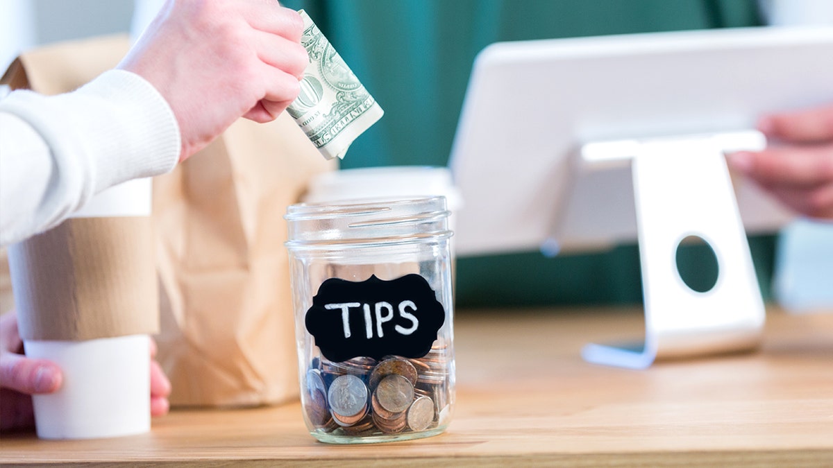 Americans are fed up with tipping culture as nearly 9 in 10 say it's completely 'out of control' at george magazine