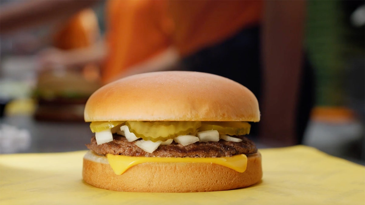 Whataburger's Whataburger cheeseburger is shown.