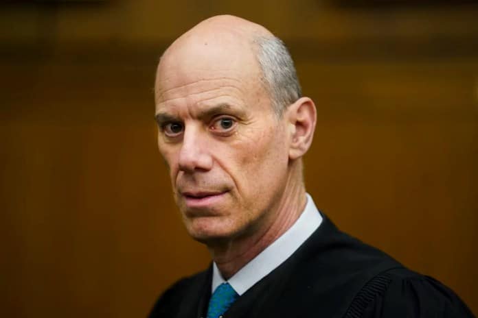 U.S. District Judge James Boasberg, chief judge of the U.S. District Court for the District of Columbia, stands for a portrait at E. Barrett Prettyman Federal Courthouse in Washington, March 16, 2023.