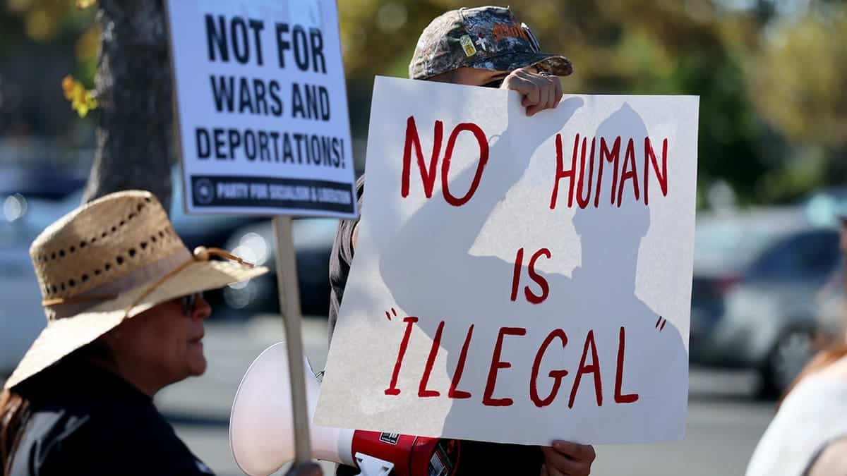 No human is illegal protesters