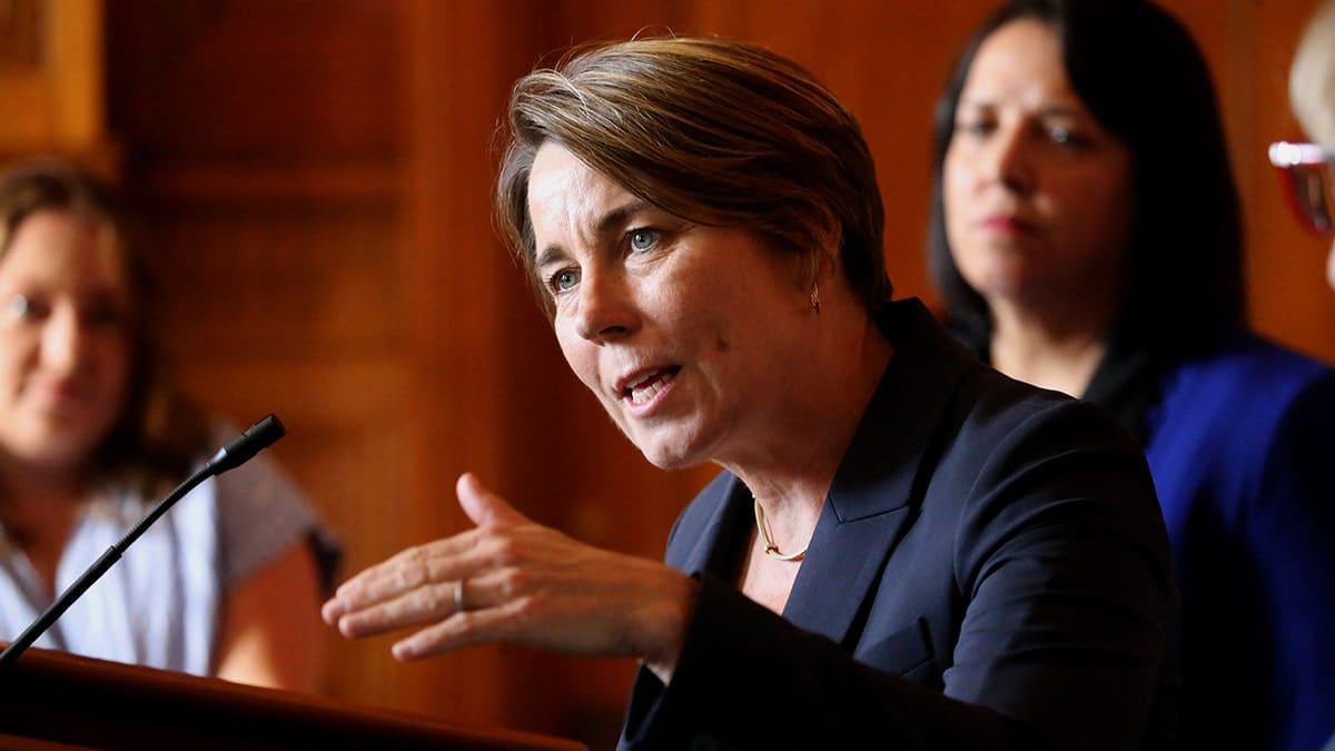 Massachusetts Gov. Maura Healey answering questions at a news conference in Boston