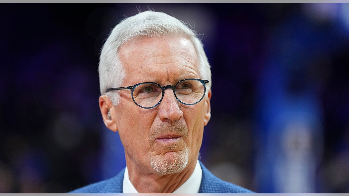 ESPN play-by-play commentator Mike Breen looking on court at Wells Fargo Center