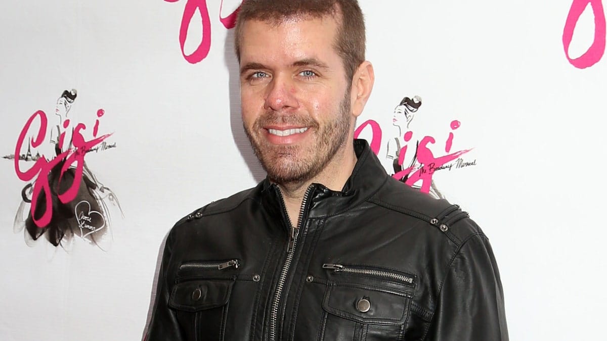 Perez Hilton standing at the Broadway opening night of Gigi at Neil Simon Theatre