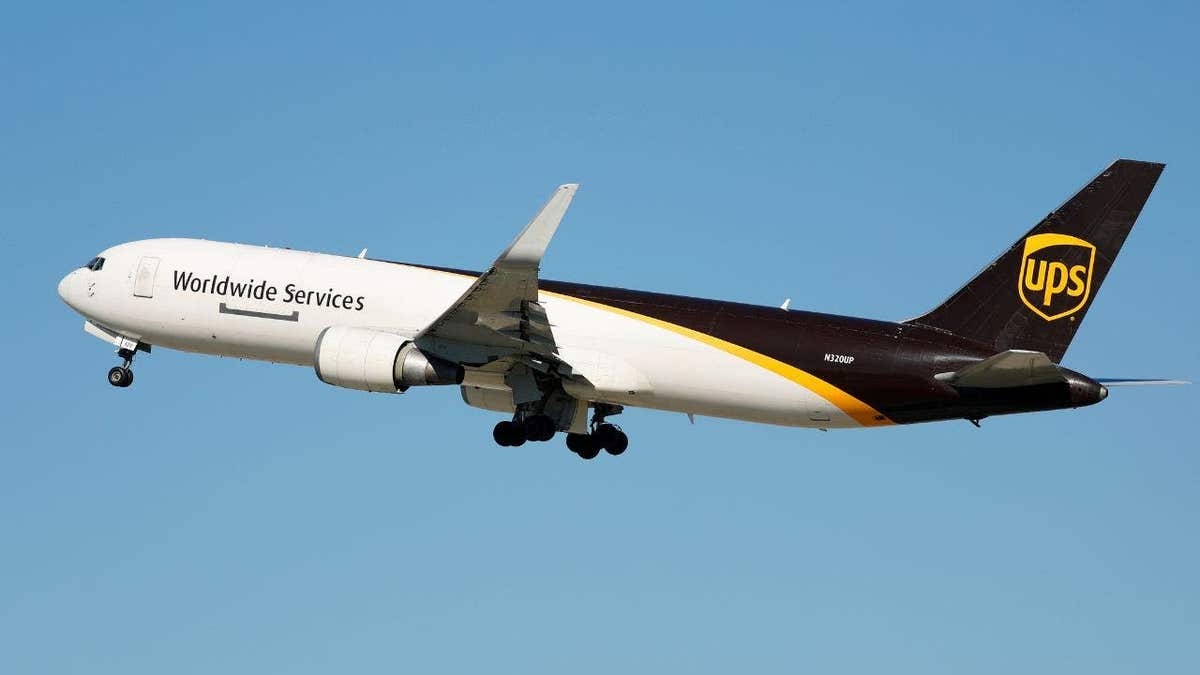 UPS Boeing 767 cargo plane in flight approaching landing