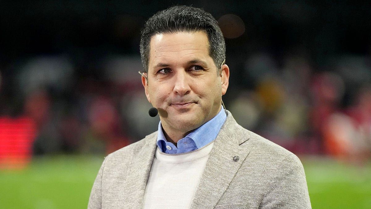 Adam Schefter on the sideline