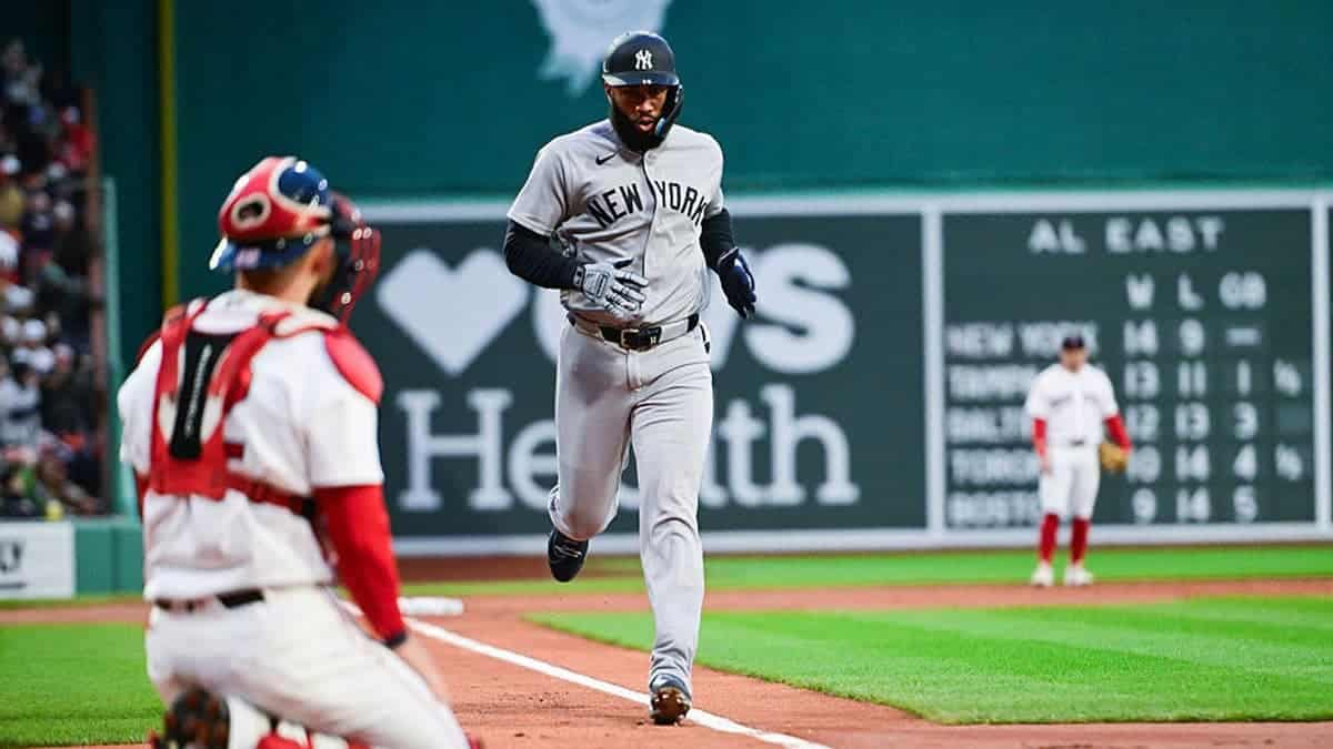 Amed Rosario jogging home after hitting a three-run home run at Fenway Park.
