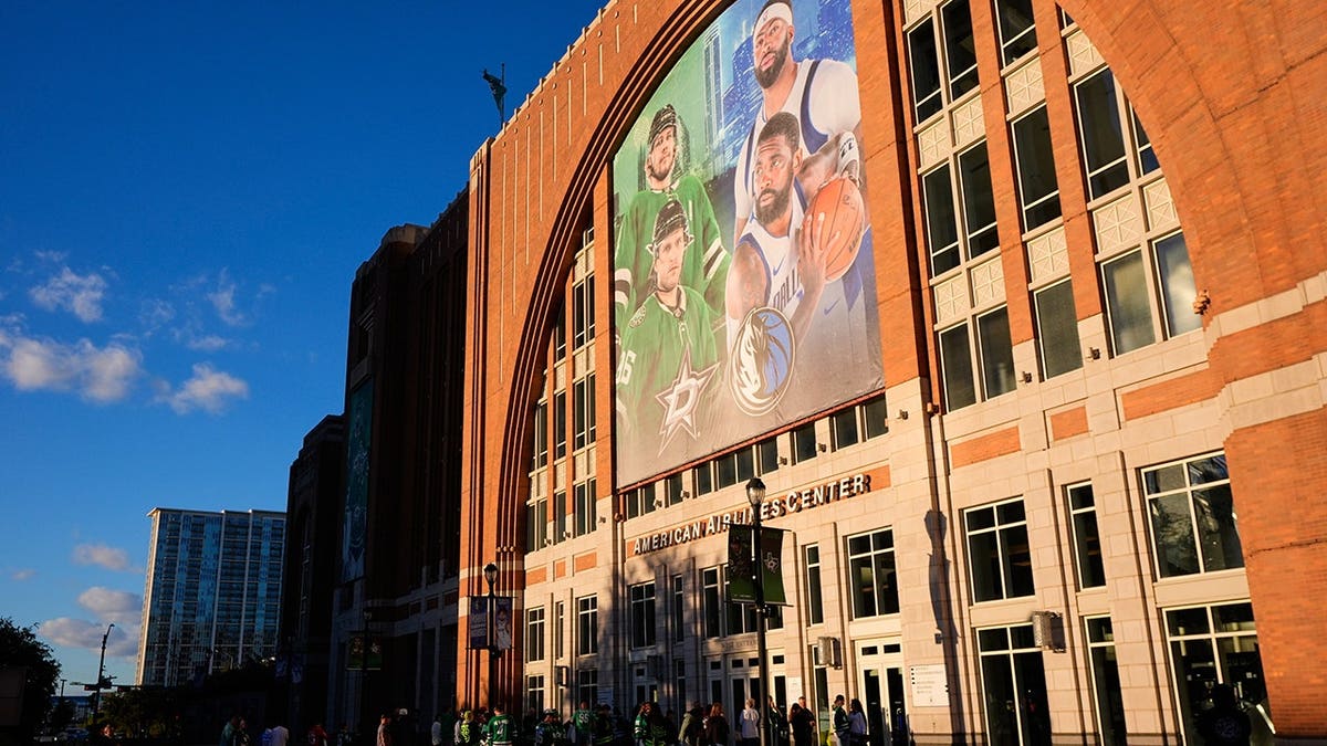 Fans lining up outside American Airlines Center before an NHL hockey game in Dallas