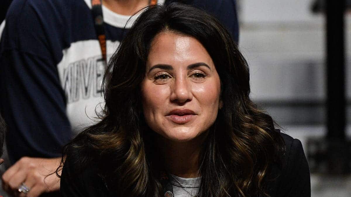 Andrea Hurley watching a college basketball game at Mohegan Sun Arena