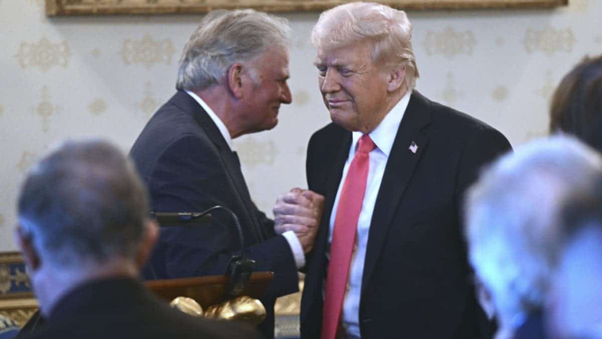 President Donald Trump greeting Rev. Franklin Graham in the Blue Room of the White House