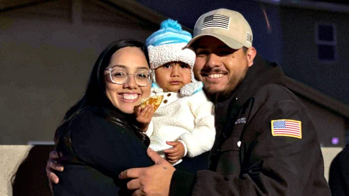 Anna pictured with her mother and father