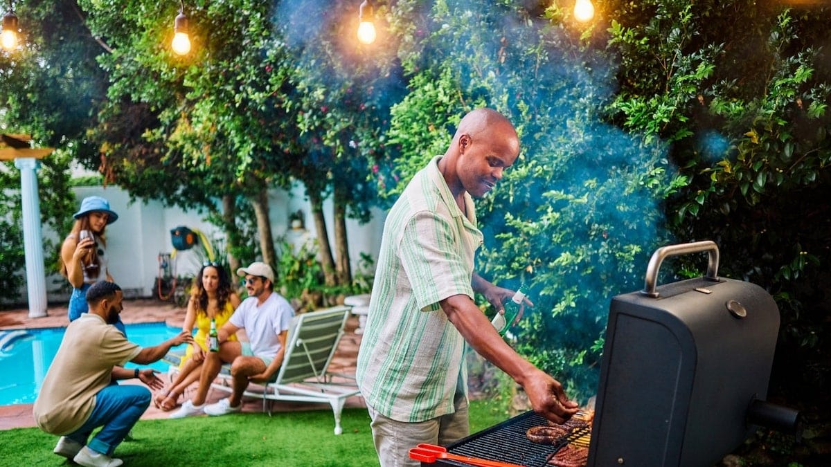 friends backyard grilling during the spring