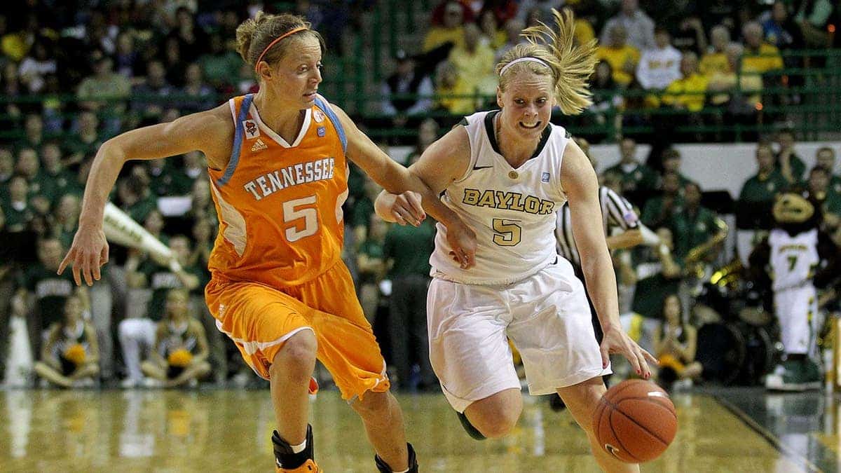 Baylor Bears Melissa Jones driving against Tennessee Volunteers Angie Bjorklund at Ferrell Center