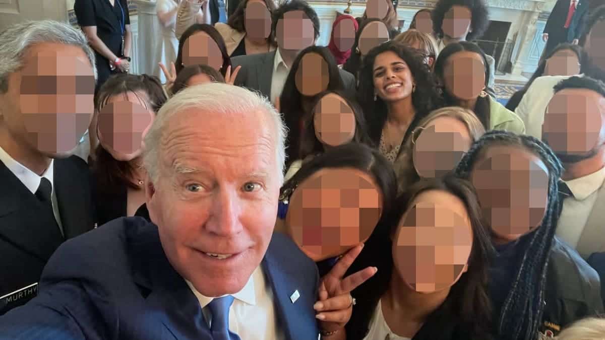 Meera Varma takes selfie with former President Joe Biden at an event