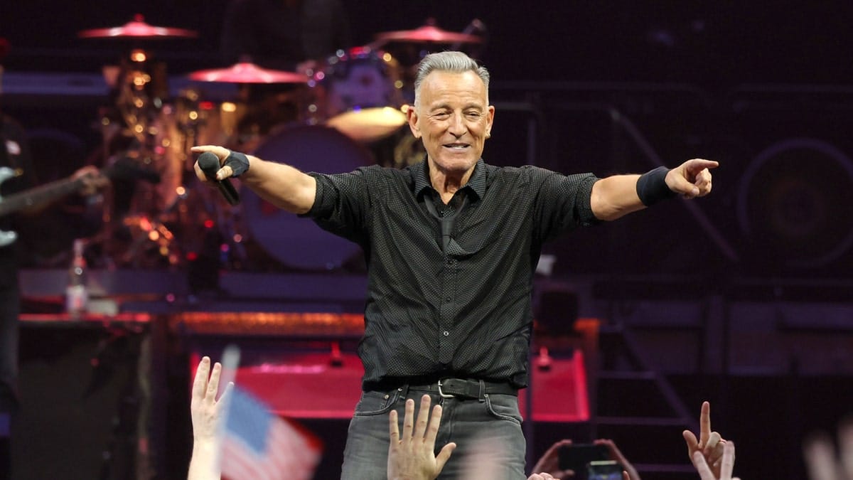 Bruce Springsteen and the E Street Band perform on stage at the Target Center.
