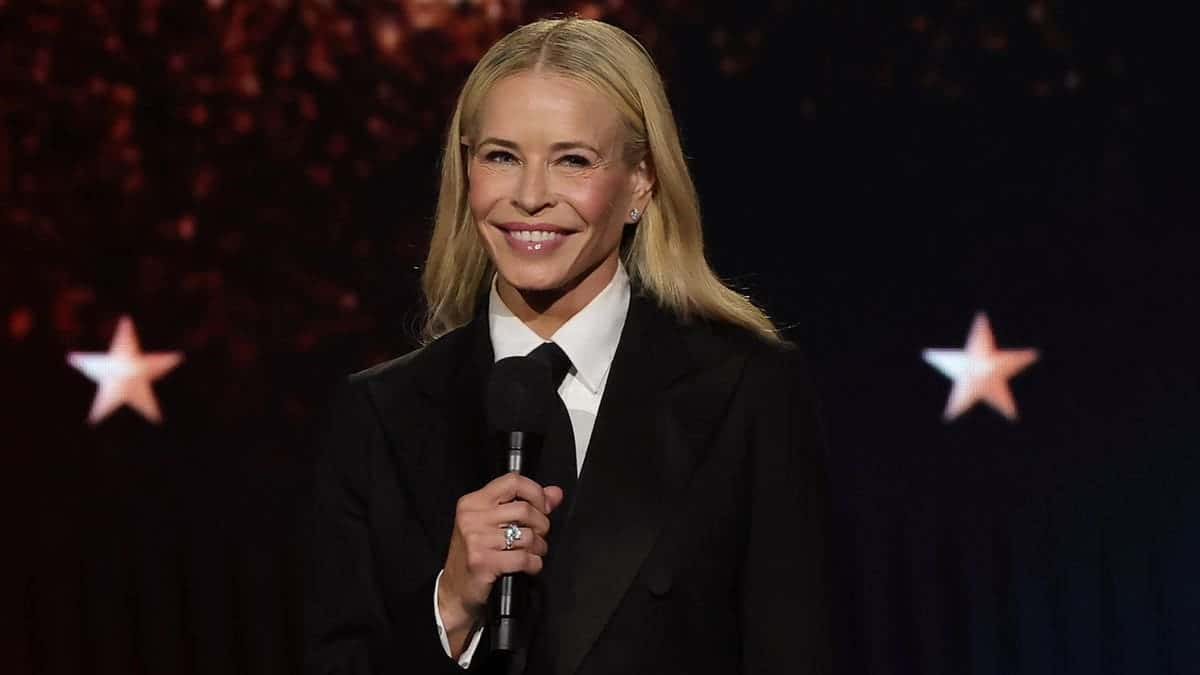 Chelsea Handler on stage in a suit hosting the Critic's Choice Awards in January 2026.