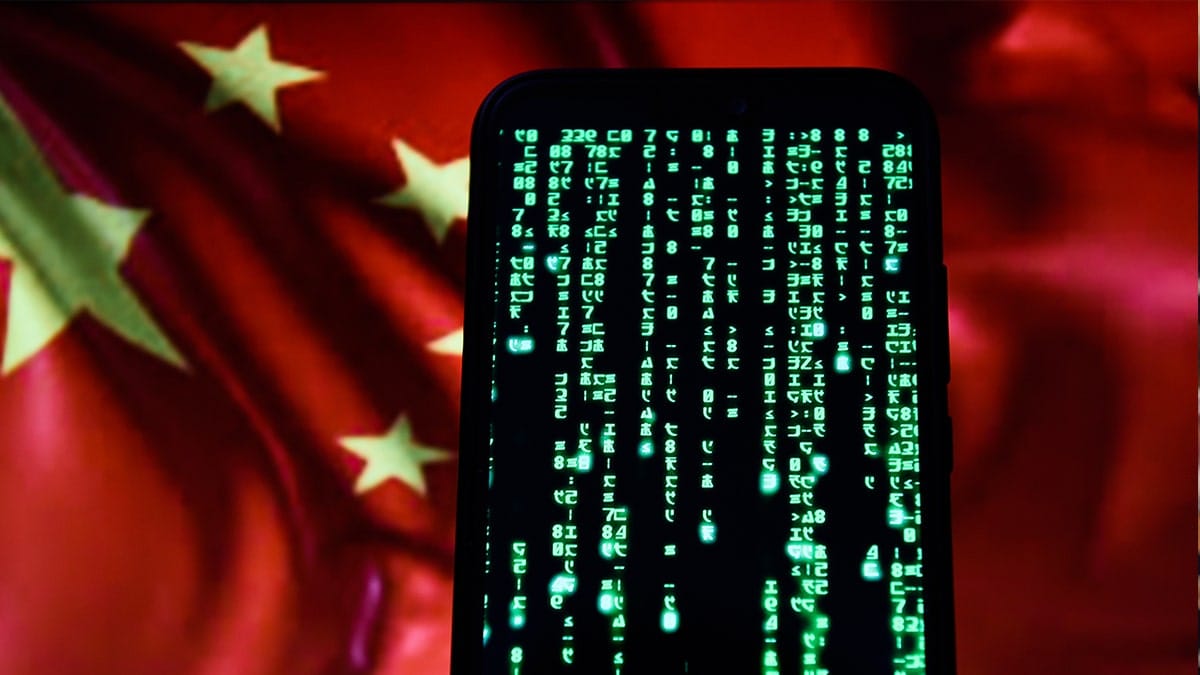 In this photo illustration, Matrix code is seen displayed on an Android mobile phone with Chinese flag in the background.