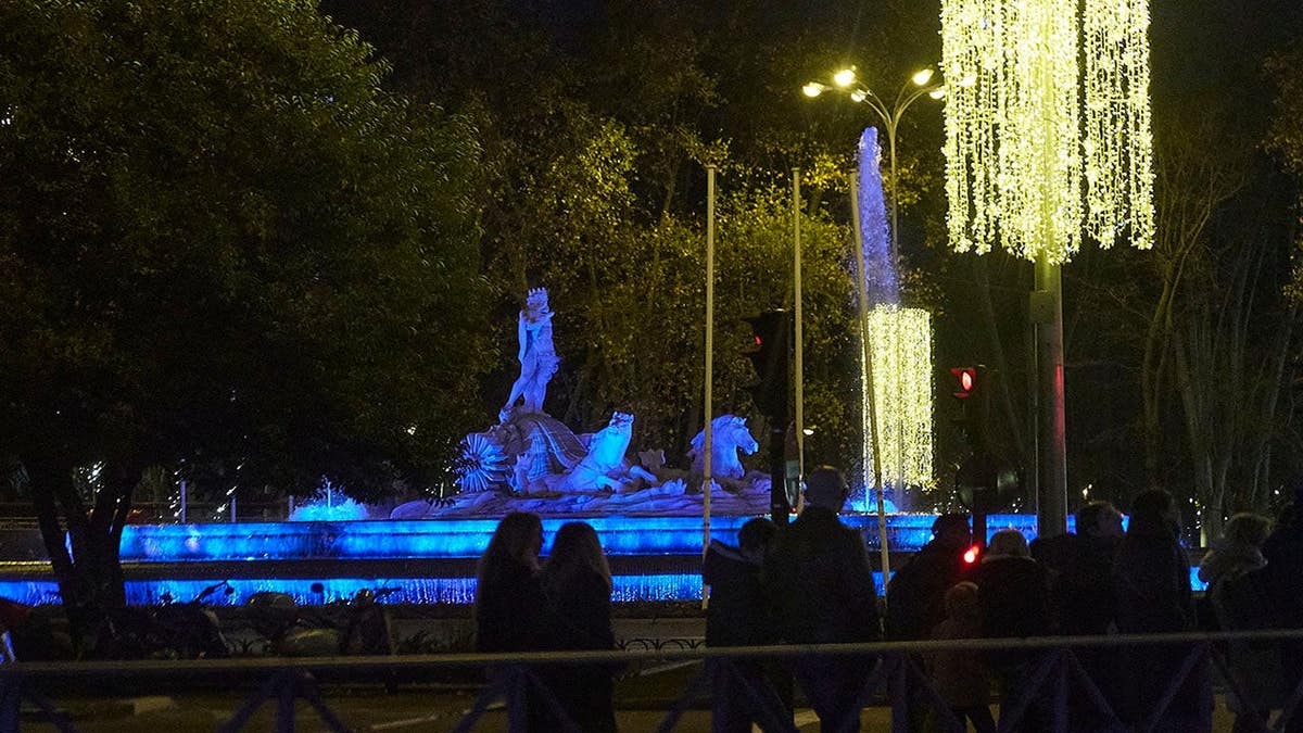 Christmas lighting decorations illuminated in Plaza de Neptuno Madrid Spain