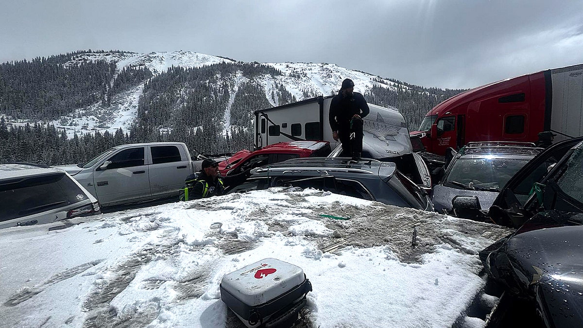 Rescuers navigate Colorado crash scene