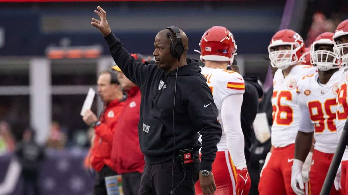 Kansas City Chiefs defensive backs coach Dave Merritt standing on the sidelines at Gillette Stadium