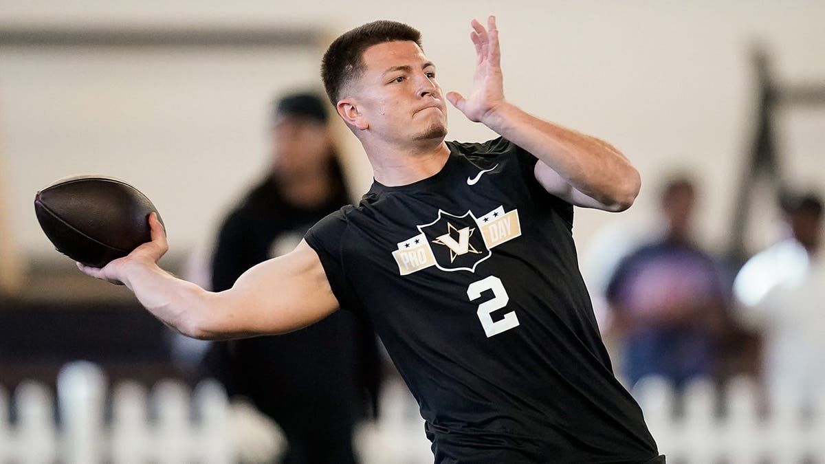Vanderbilt quarterback Diego Pavia throwing a football during pro day at Vanderbilt University