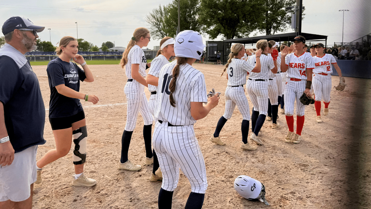 Transgender pitcher Marissa Rothenberger pitching during a Minnesota high school softball game