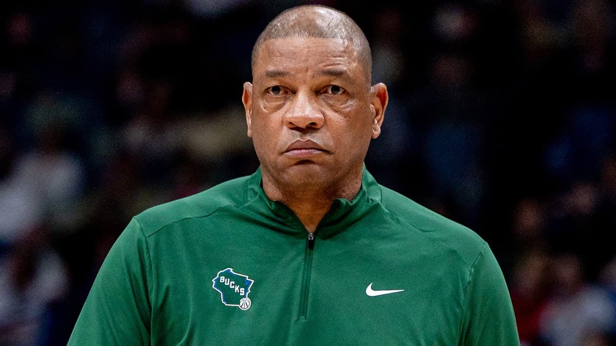 Milwaukee Bucks head coach Doc Rivers watching game at Smoothie King Center