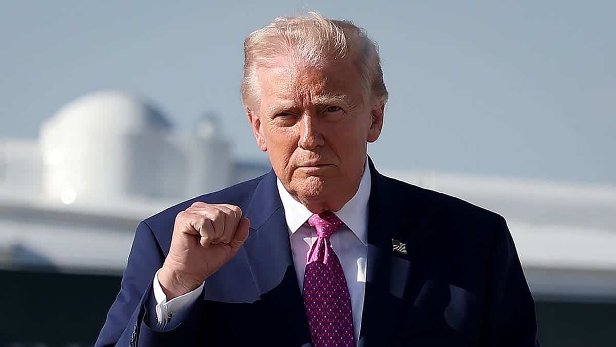 U.S. President Donald Trump walking toward reporters at Joint Base Andrews