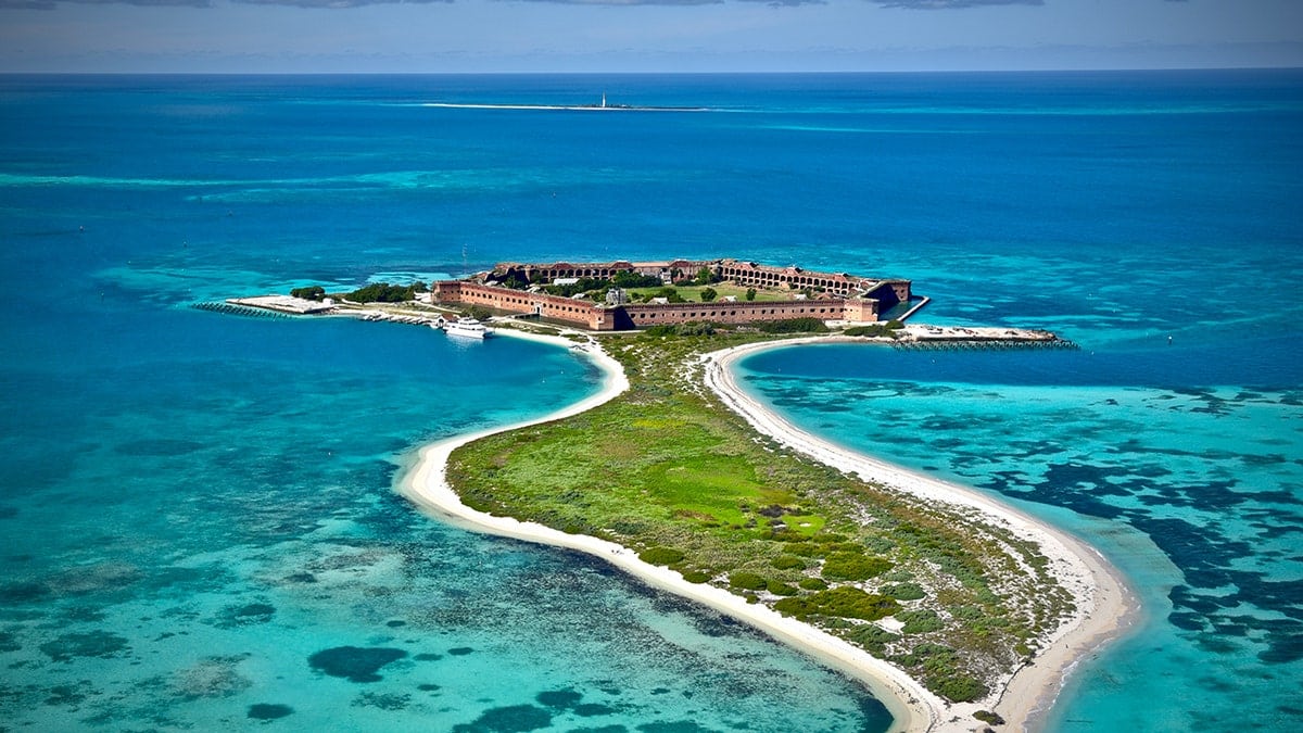 Aerial view of Fort Jefferson surrounded by turquoise waters and sandy islands in Dry Tortugas National Park