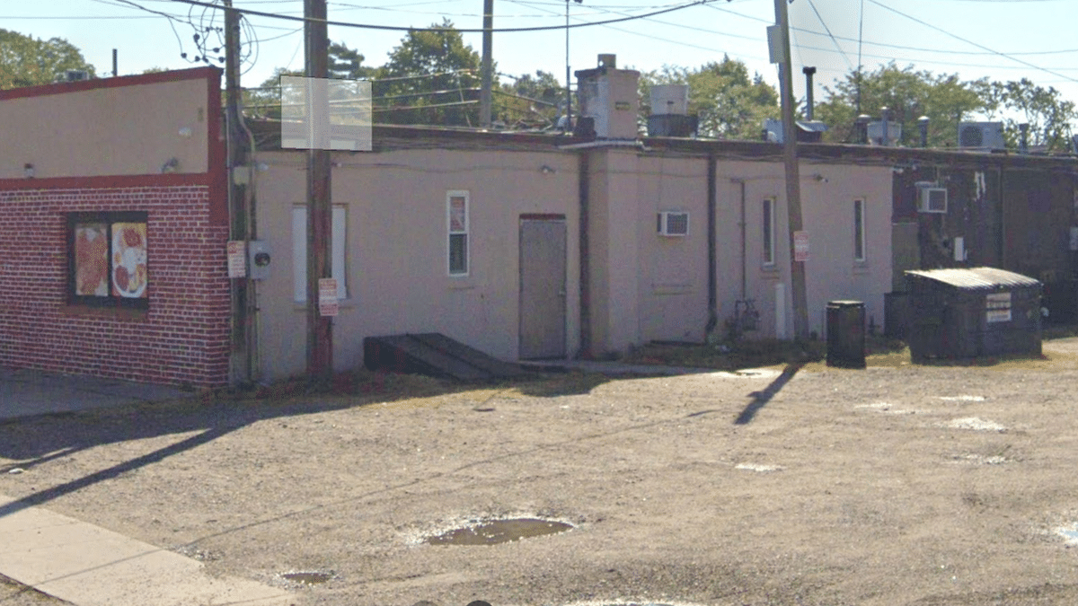 The rear parking lot showing a dumpster where Bonilla Garcia allegedly attacked his victim.