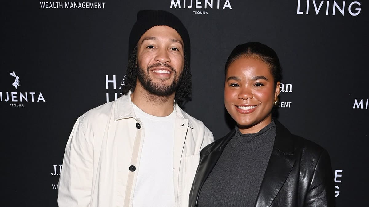 Jalen and Erica Brunson smile on red carpet