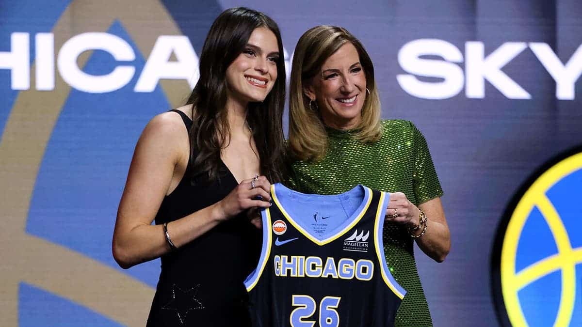 UCLA guard Gabriela Jaquez posing with WNBA commissioner Cathy Engelbert after draft selection