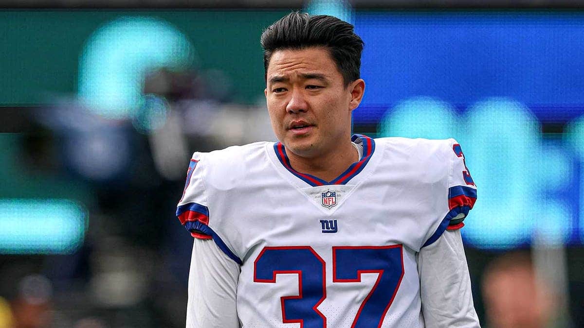 New York Giants place kicker Younghoe Koo standing on the field at MetLife Stadium