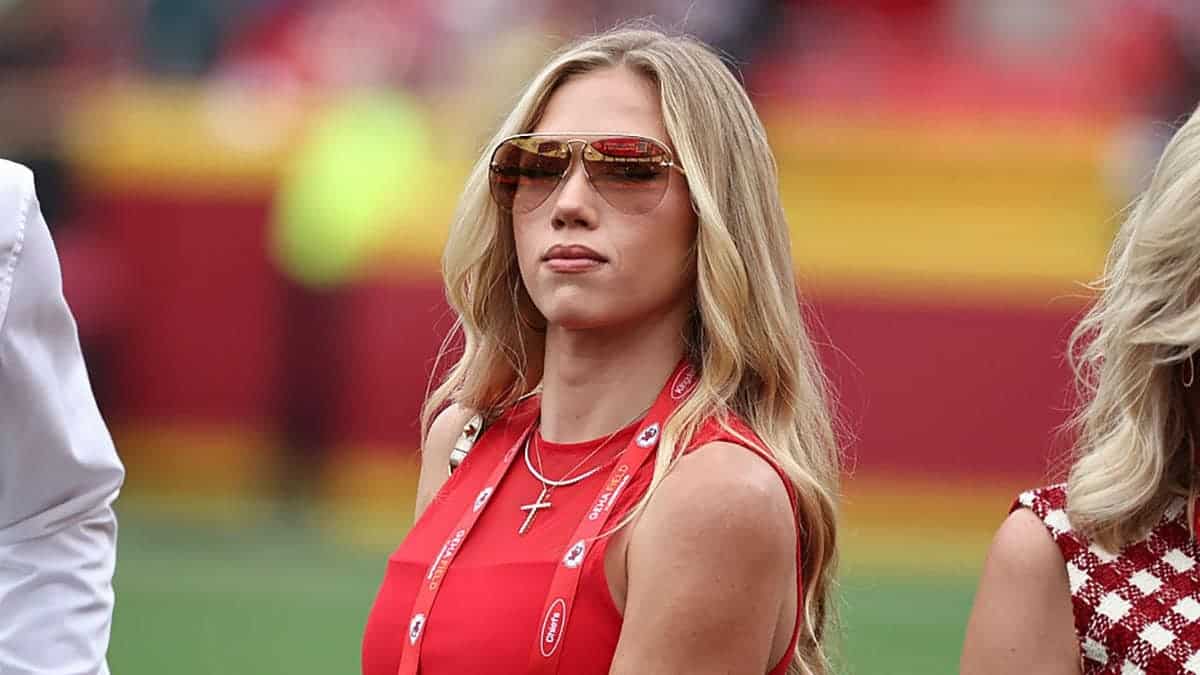 Gracie Hunt standing on the sidelines at GEHA Field at Arrowhead Stadium in Kansas City, Missouri