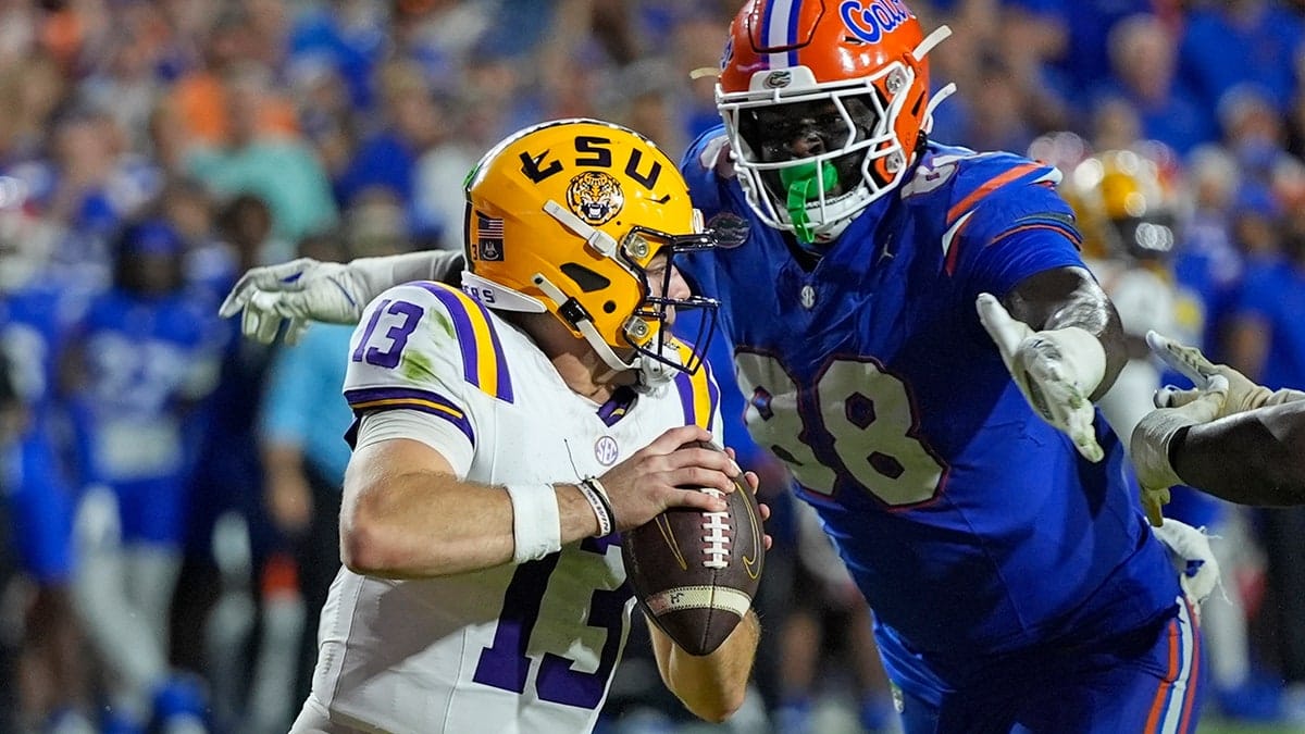 Florida defensive lineman Caleb Banks sacks LSU quarterback Garrett Nussmeier during a football game