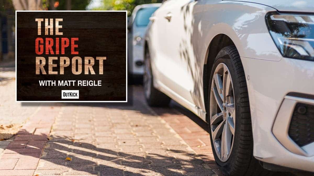 Gripe Report logo and a white car parallel parked