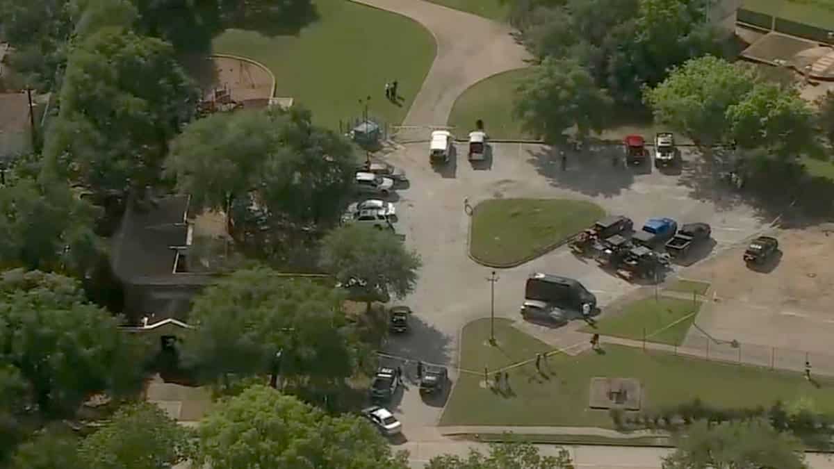 Police searched the area where a body was found in Houston on Thursday.