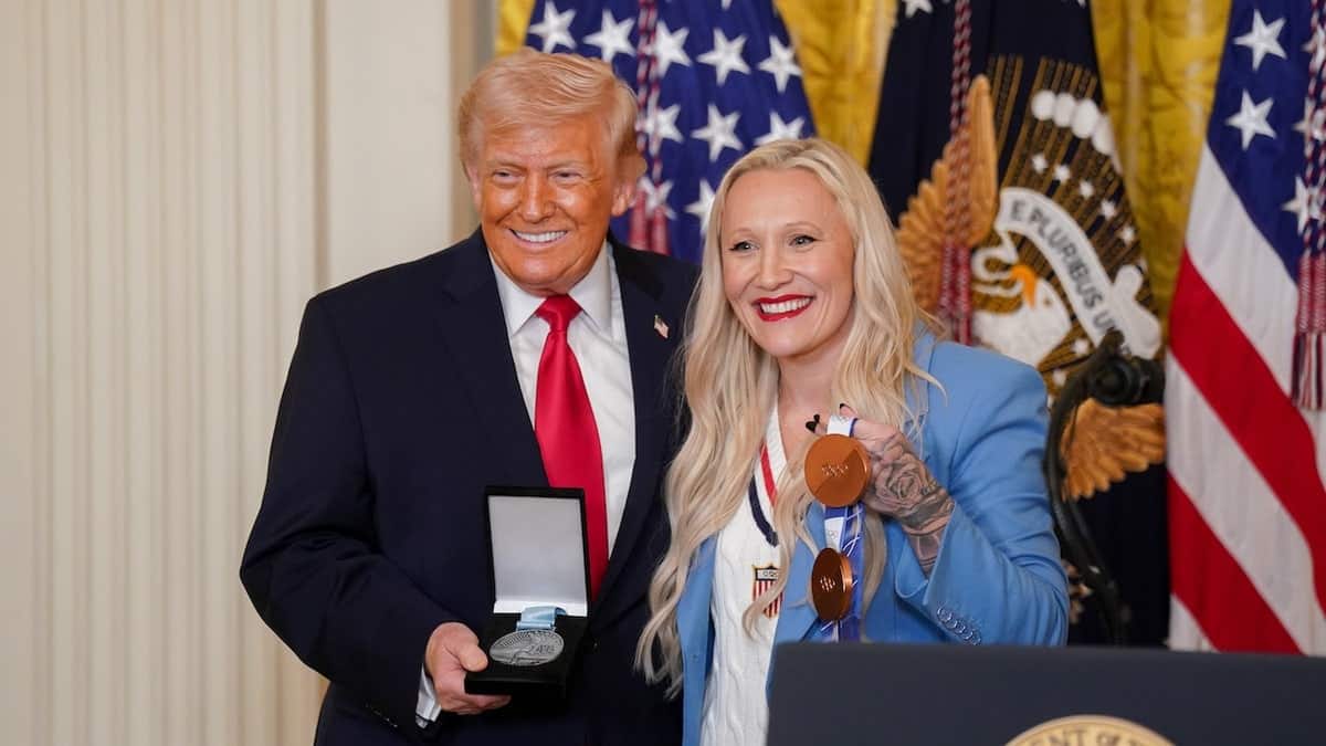 Kaillie Humphries presenting the Order of Ikkos to President Donald Trump in the White House East Room