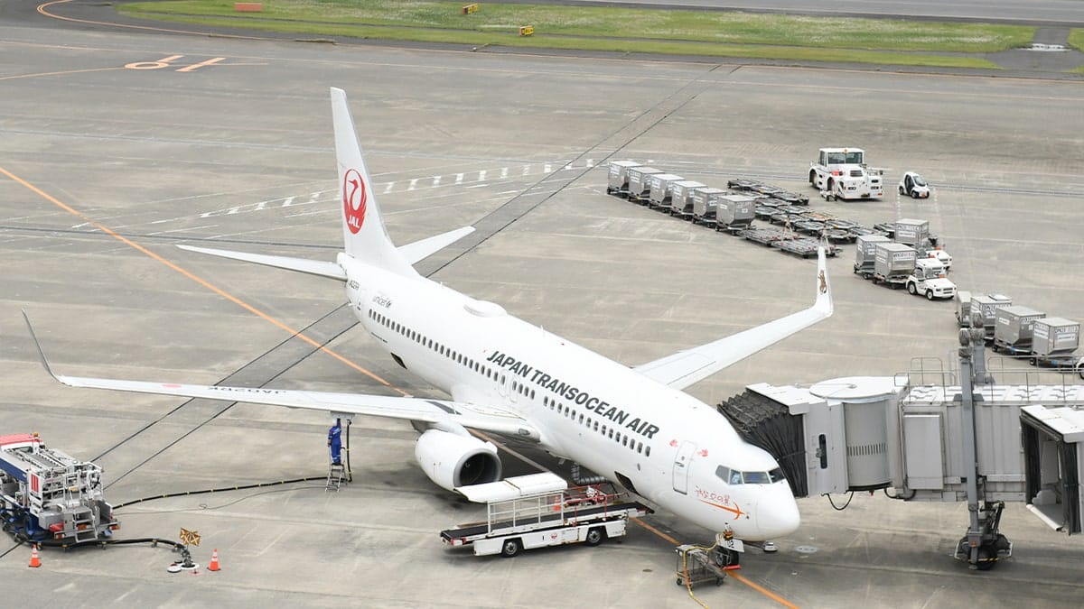 A Japan Airlines passenger aircraft parked at Haneda Airport in Tokyo
