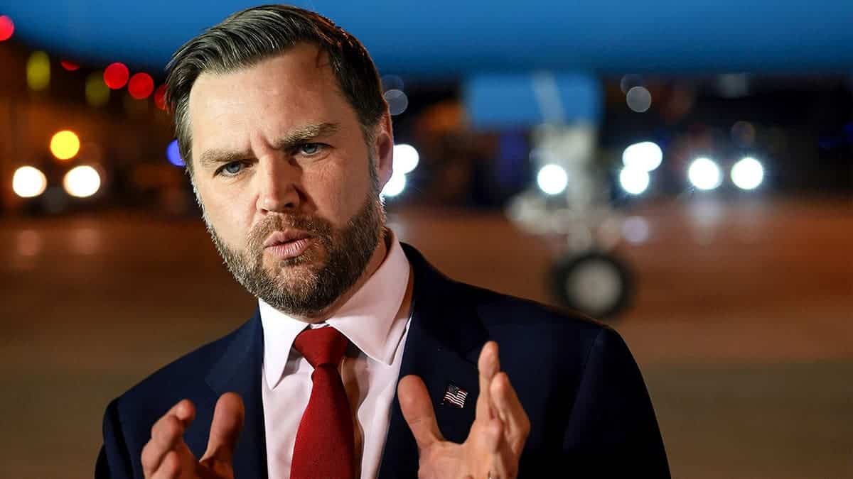Vice President JD Vance speaks to reporters before boarding Air Force Two.