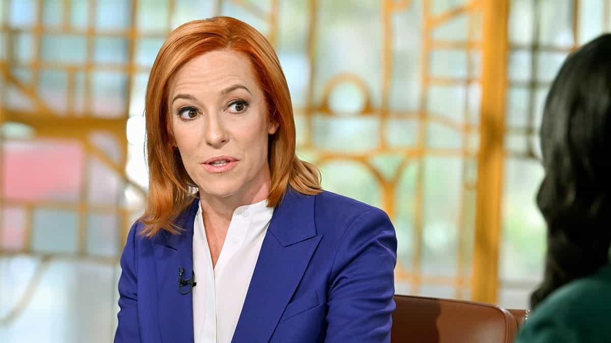 Jen Psaki seated on Meet the Press set in Washington D.C.