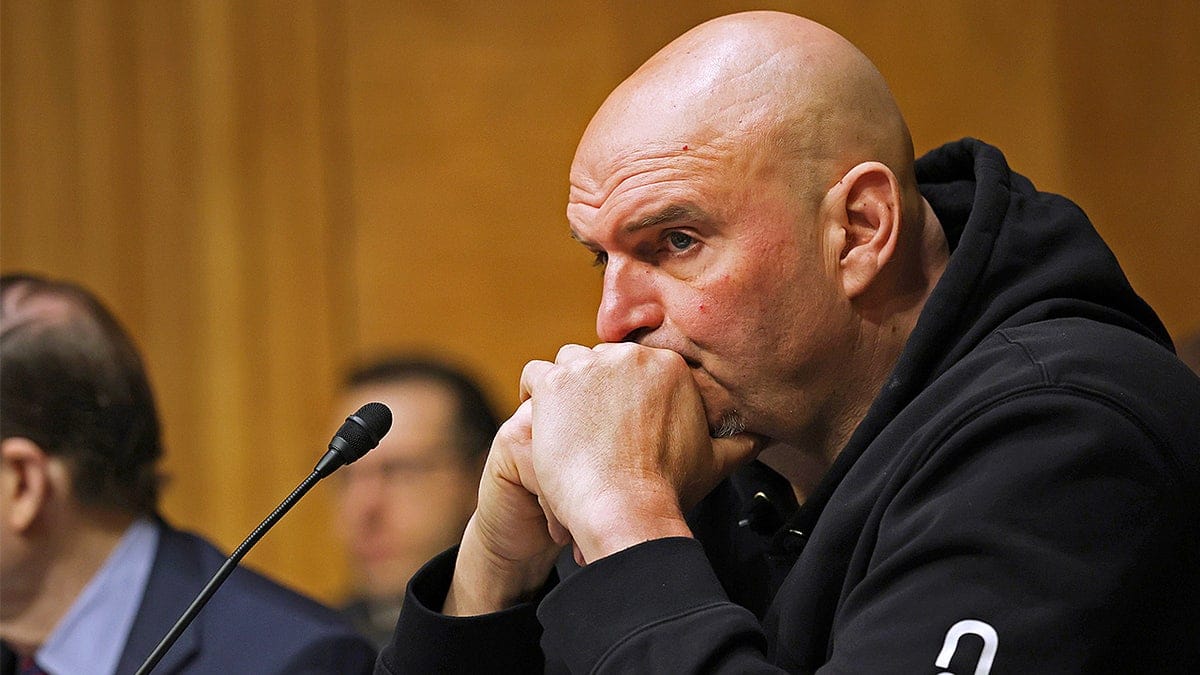 Sen. John Fetterman listens during a confirmation hearing in the Dirksen Senate Office Building