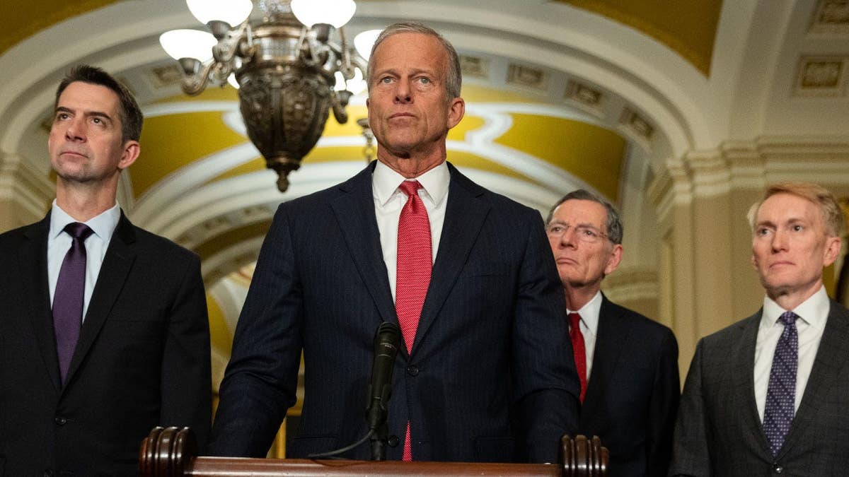 Senate Majority Leader John Thune speaking at a press conference in Washington, D.C.
