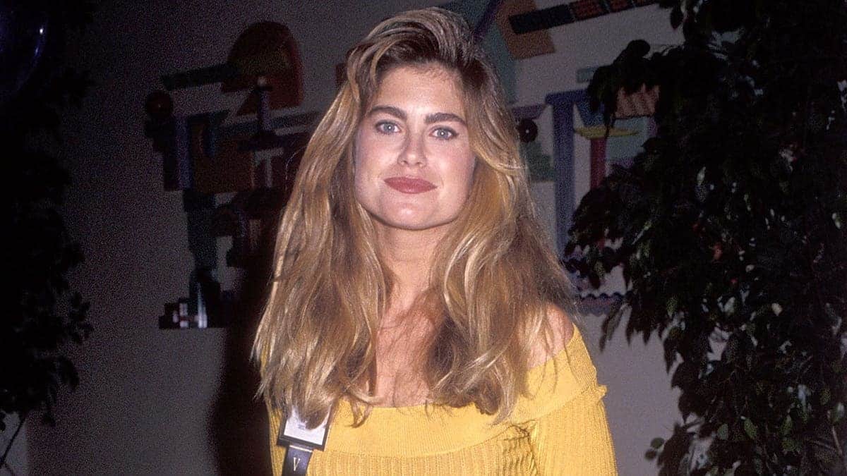 Kathy Ireland wears yellow dress on red carpet