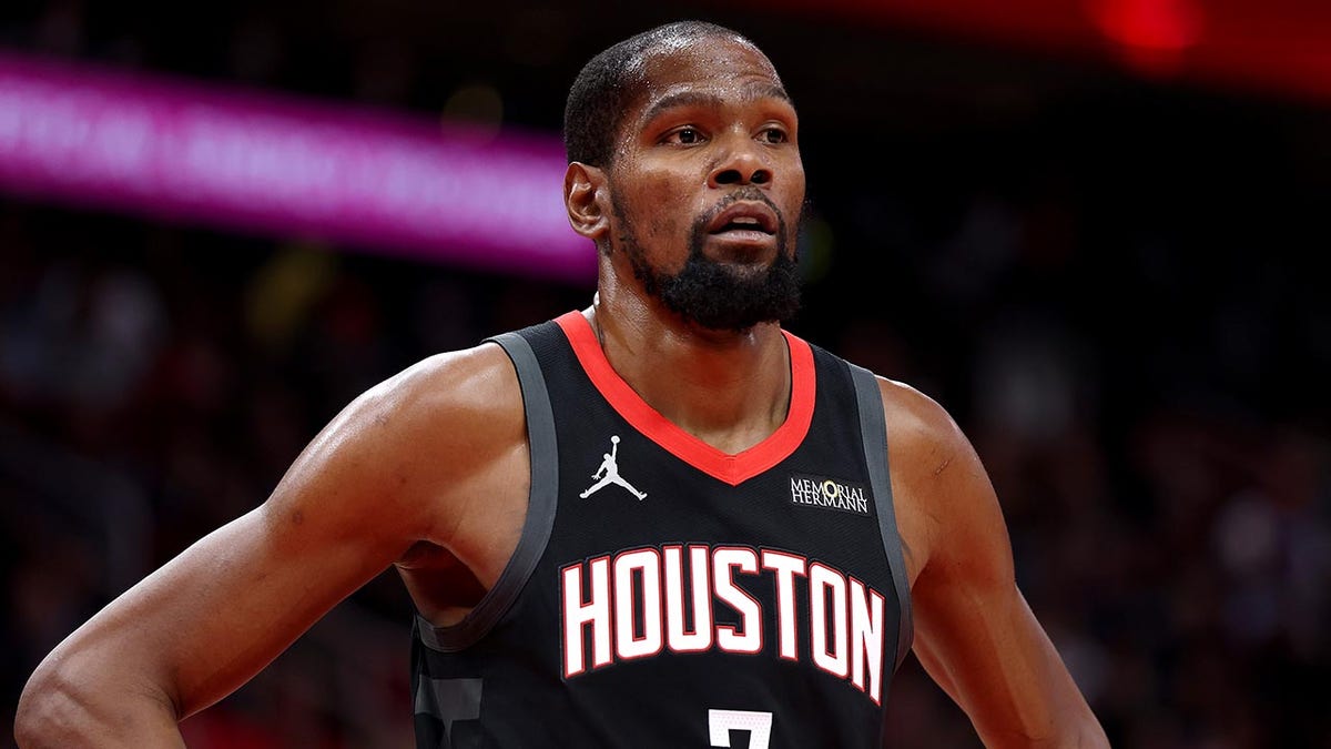 Kevin Durant wearing number 7 reacts during a basketball game at Toyota Center in Houston