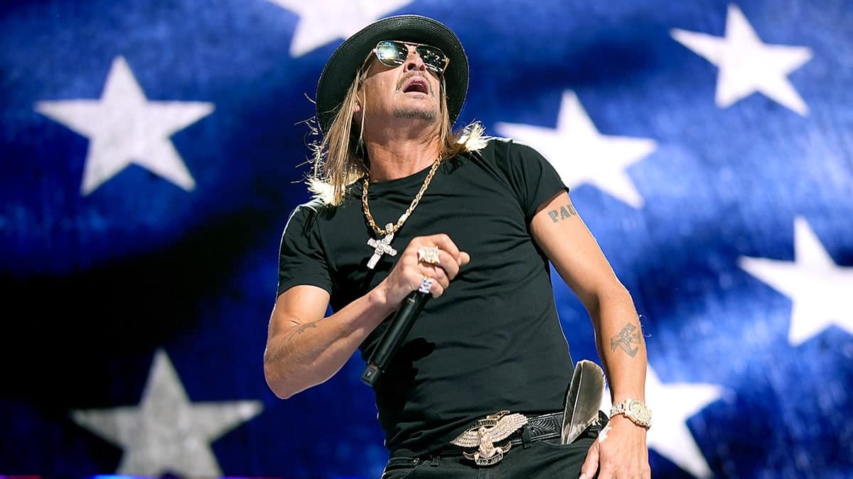 Musician Kid Rock performing on stage at the Fiserv Forum in Milwaukee