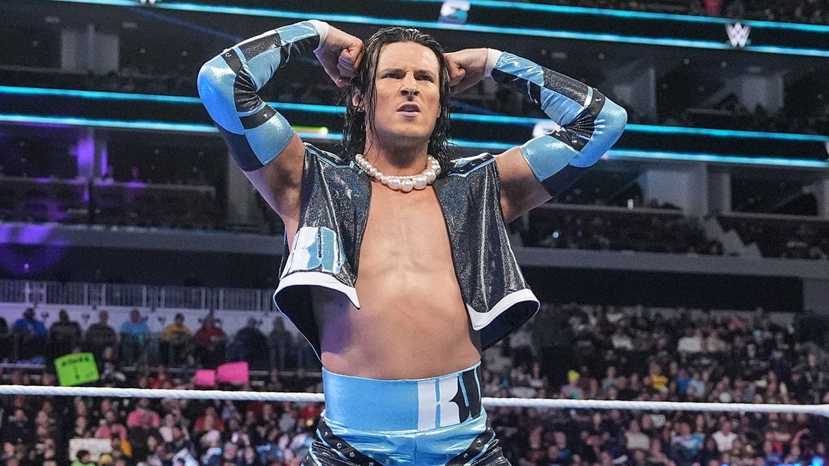 Kit Wilson entering the wrestling ring at Spectrum Center in Charlotte