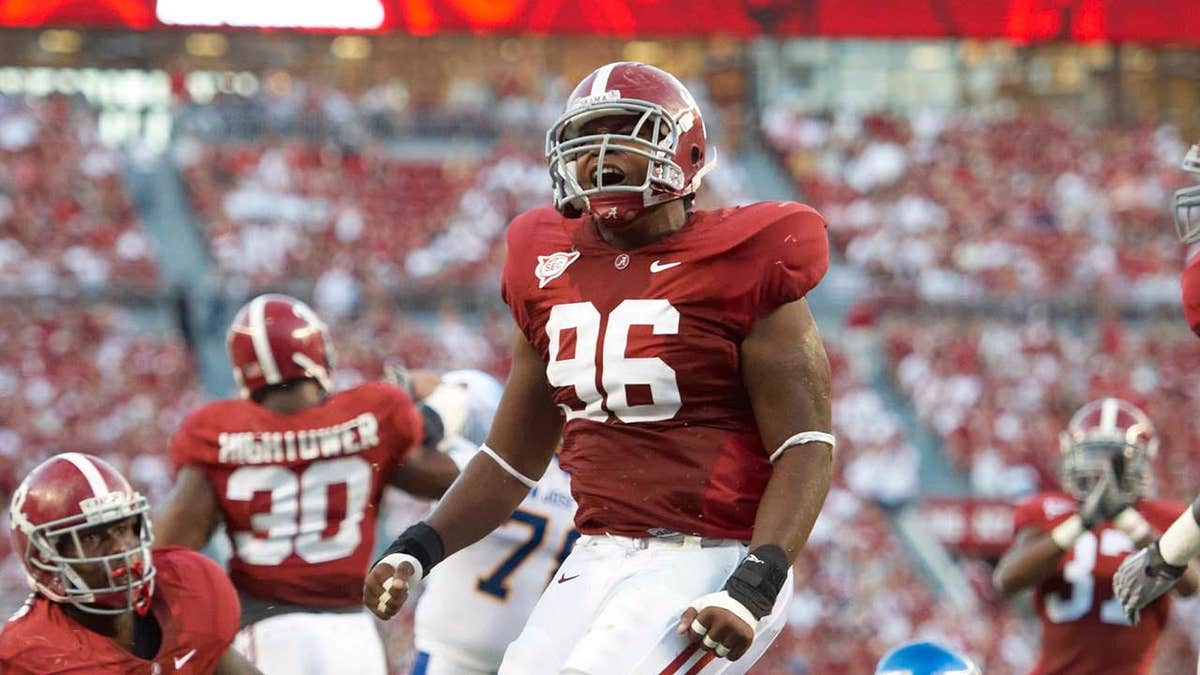 Luther Davis celebrating victory during college football game in Tuscaloosa